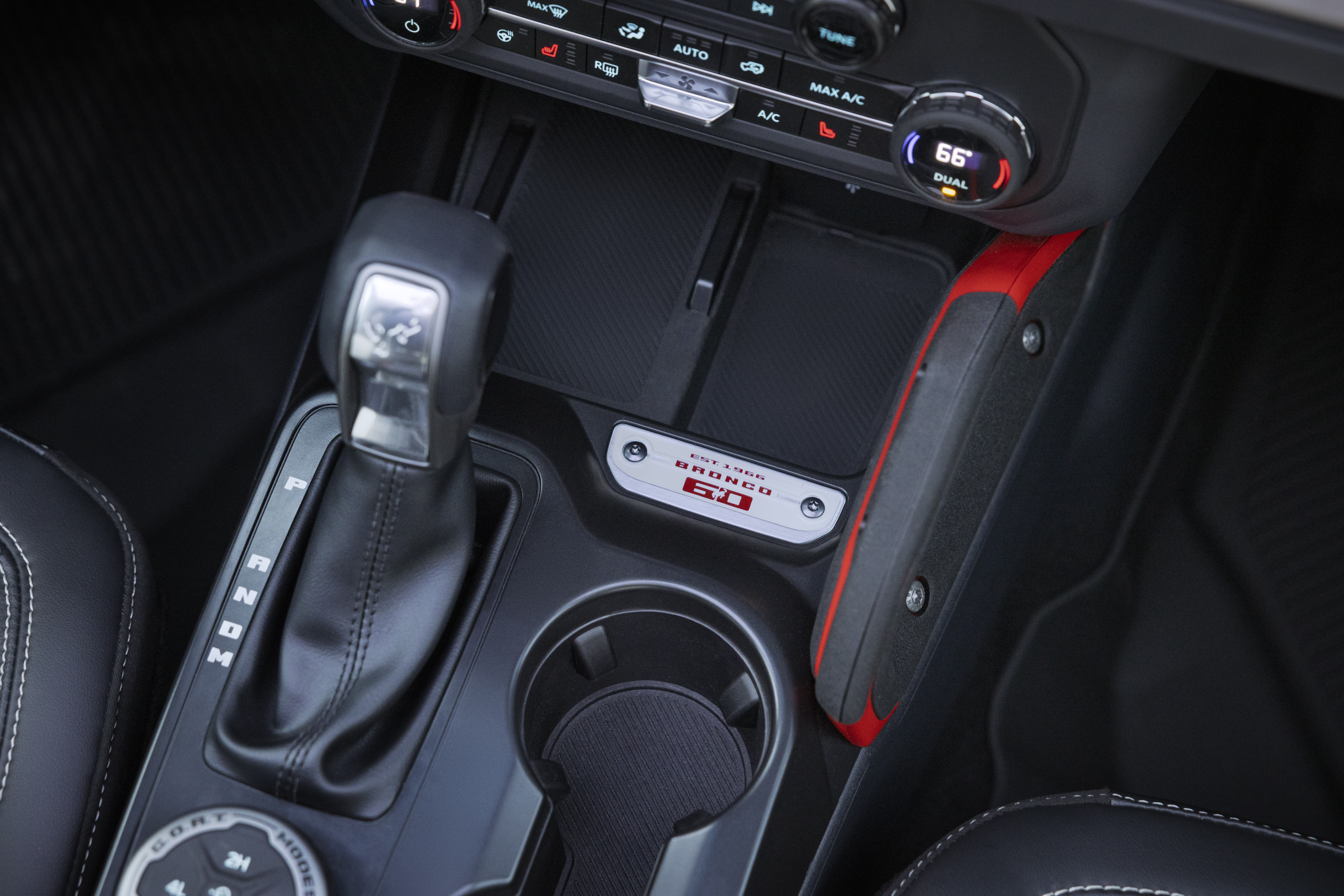 2026 Ford Bronco 60th Anniversary Package interior detail. 60th anniversary logo shown on console.